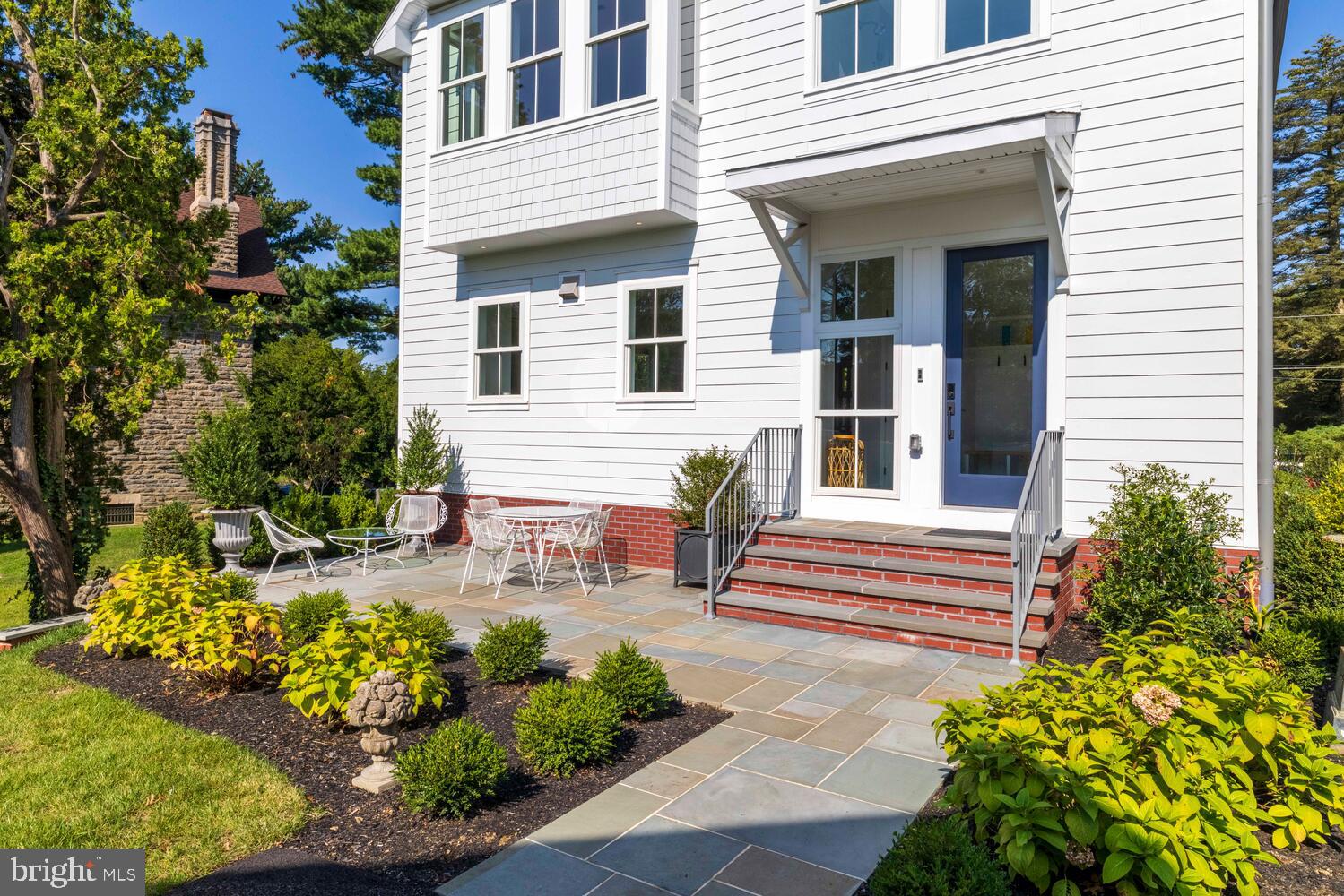 14 Pelham Road Philadelphia, PA 19119 - Photo 20 of 49 a view of a house with chairs and flower garden