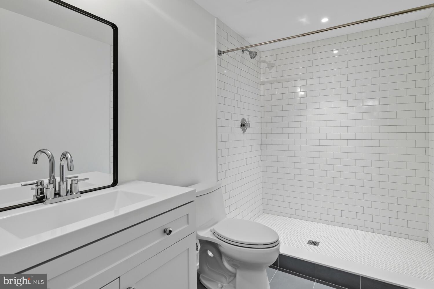 14 Pelham Road Philadelphia, PA 19119 - Photo 25 of 49 a bathroom with a sink a toilet and shower