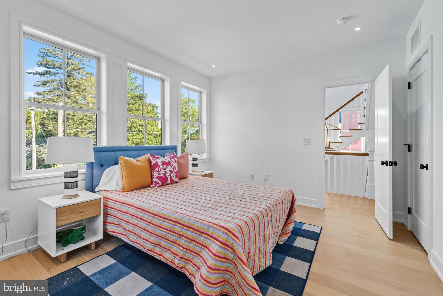 14 Pelham Road Philadelphia, PA 19119 - Photo 34 of 49 a bedroom with a bed and a chandelier