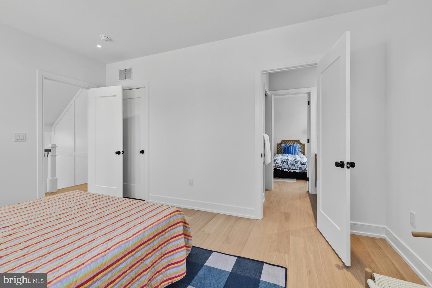 14 Pelham Road Philadelphia, PA 19119 - Photo 35 of 49 a bedroom with a bed and wooden floor