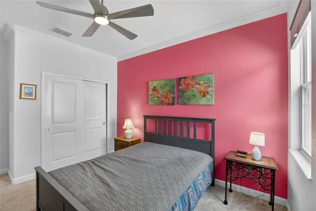 a view of a house with patio and a garden