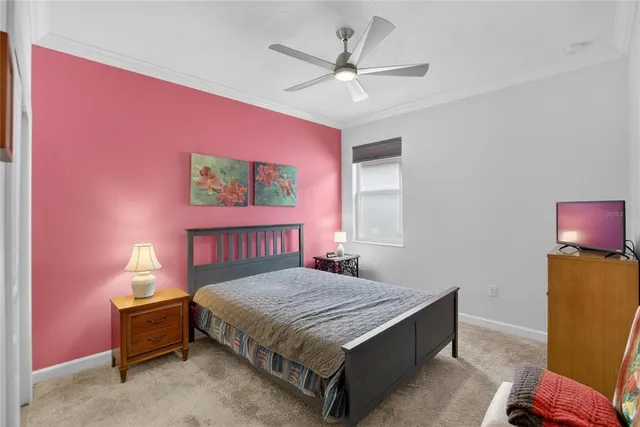 a view of a patio with table and chairs and potted plants