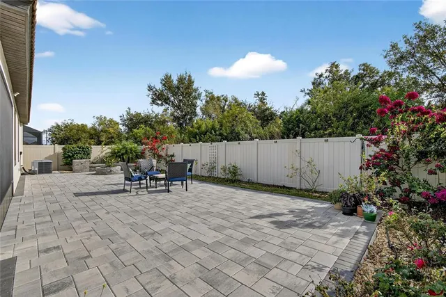 a view of a swimming pool and an ocean view