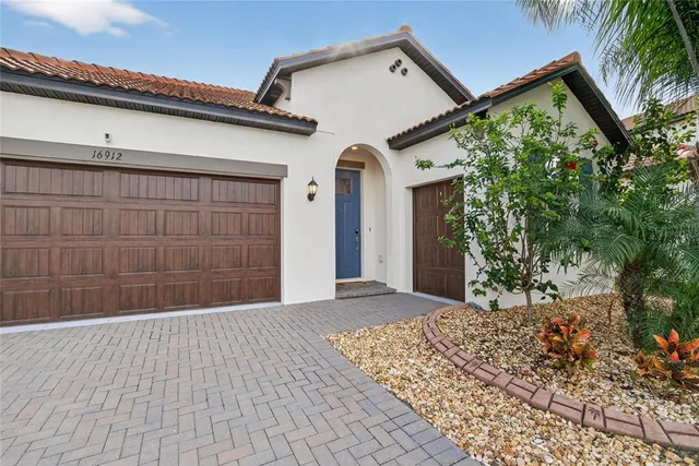 a kitchen with counter top space cabinets and stainless steel appliances