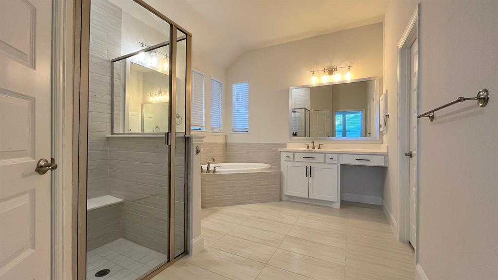 5304 Babcock Road McKinney, TX 75071 - Photo 22 of 27 a bathroom with a sink a toilet and shower