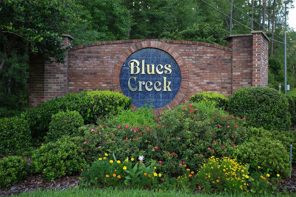 7976 48 Way Gainesville, FL 32653 - Photo 19 of 26 a view of sign board with a wooden fence