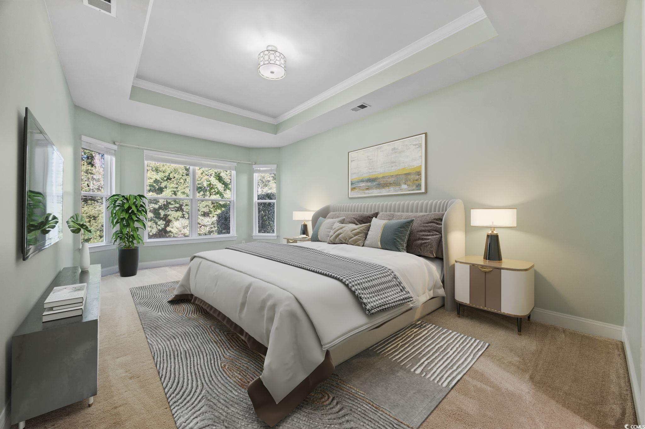 1900 Bluff Drive Myrtle Beach, SC 29577 - Photo 11 of 38 Bedroom featuring a raised ceiling, light colored carpet, and ornamental molding