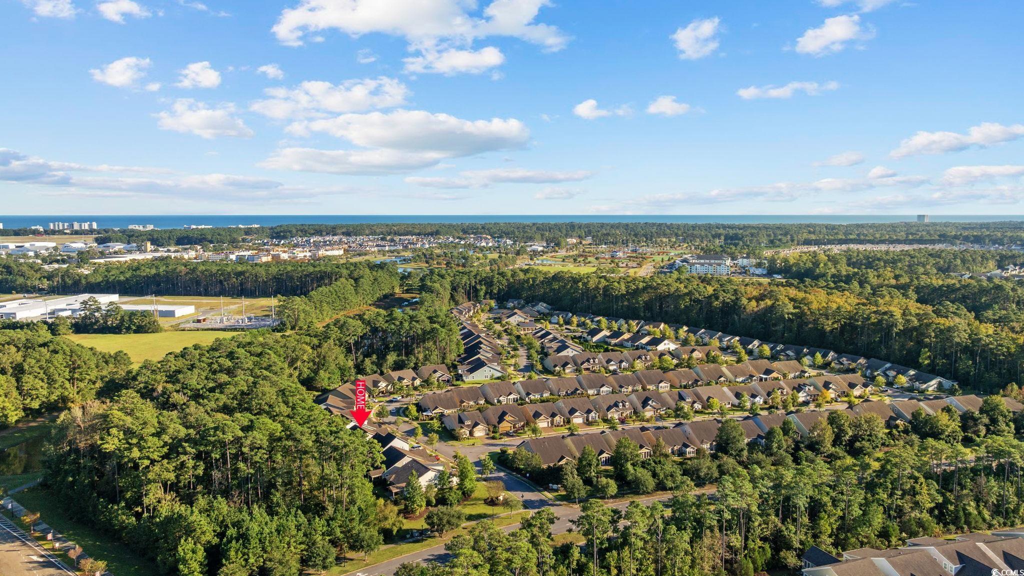 1900 Bluff Drive Myrtle Beach, SC 29577 - Photo 33 of 38 Aerial view of property's location with a large body of water and nearby suburban area