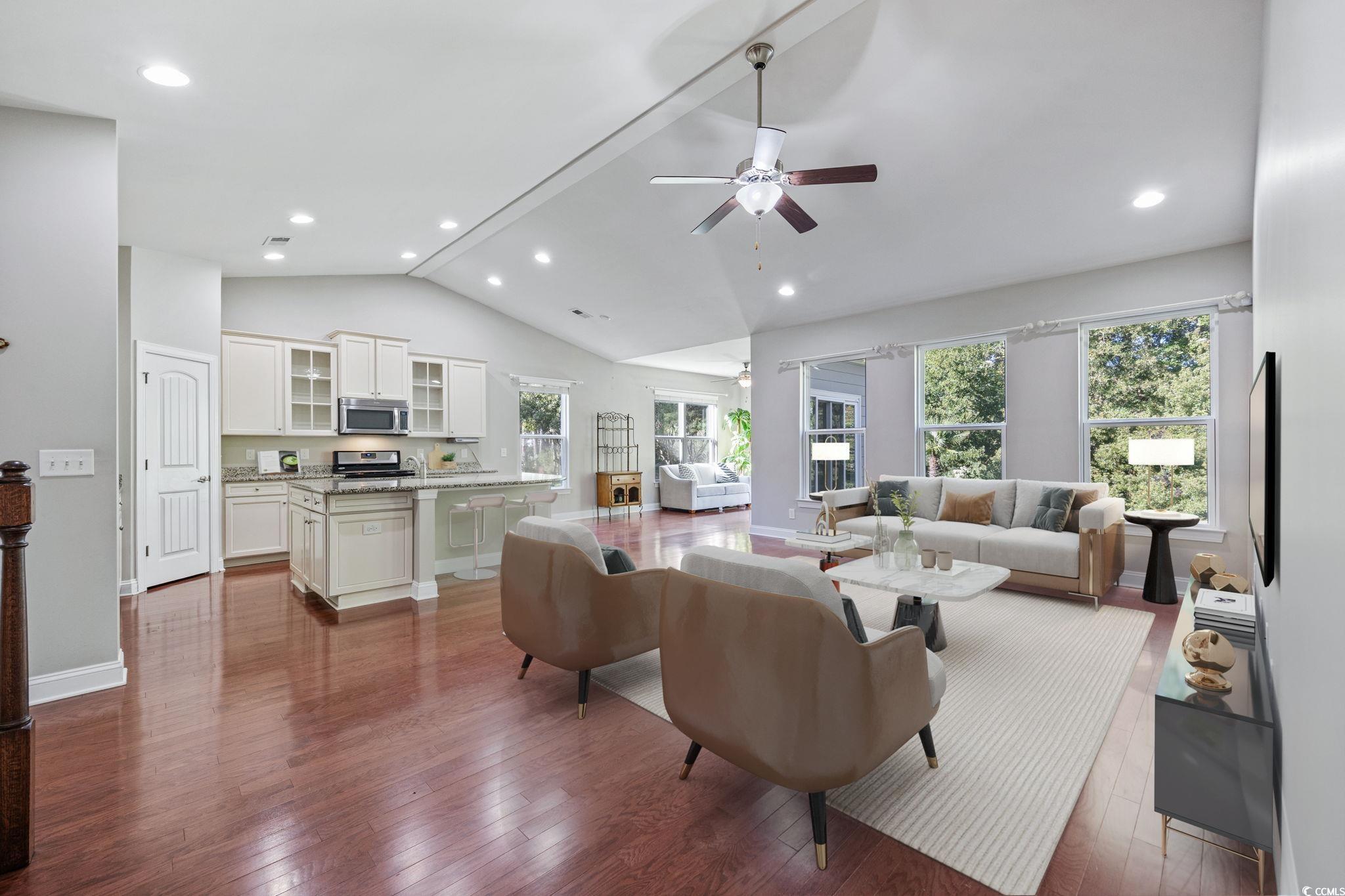 1900 Bluff Drive Myrtle Beach, SC 29577 - Photo 9 of 38 Living room with recessed lighting, dark wood-style flooring, a ceiling fan, and high vaulted ceiling