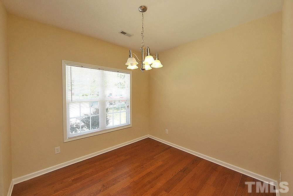 2014 Lime Street Durham, NC 27704 - Photo 2 of 17 a view of a room with wooden floor and windows