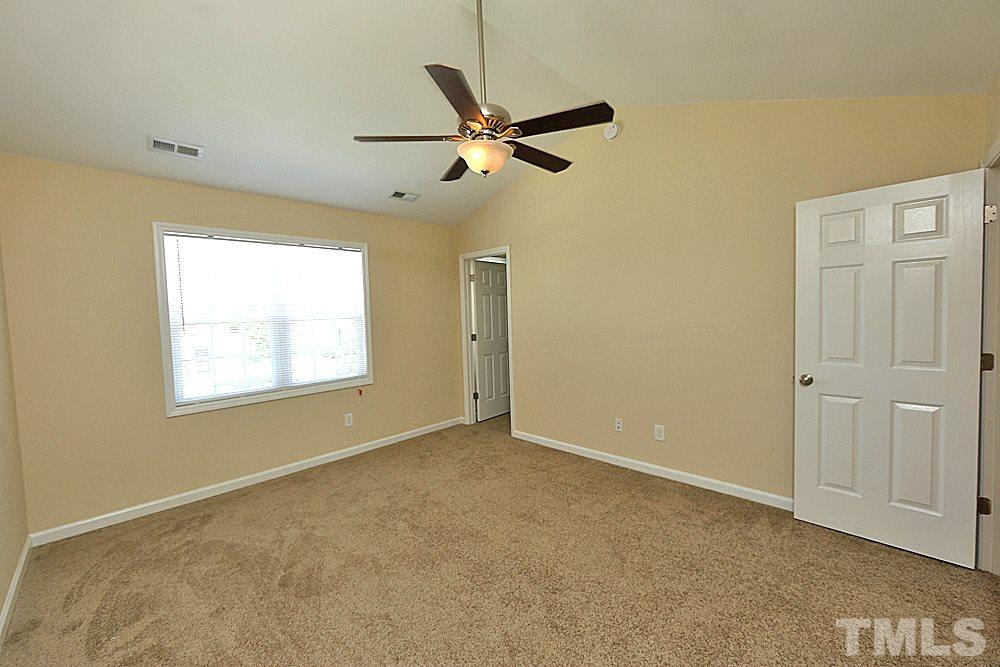 2014 Lime Street Durham, NC 27704 - Photo 12 of 17 a view of a livingroom with a ceiling fan & windows
