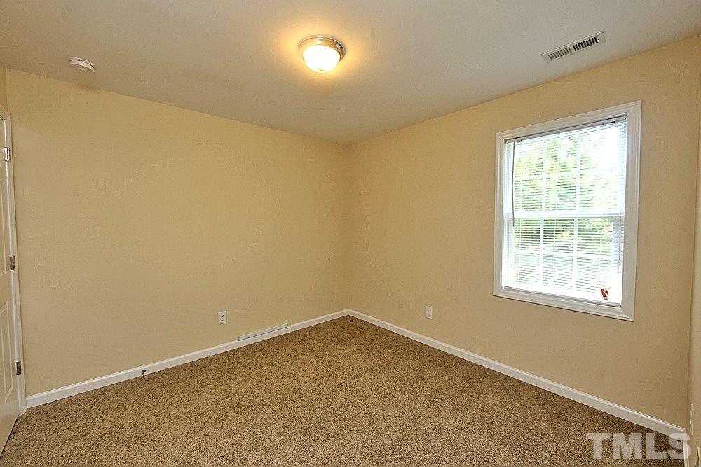 2014 Lime Street Durham, NC 27704 - Photo 14 of 17 an empty room with a window