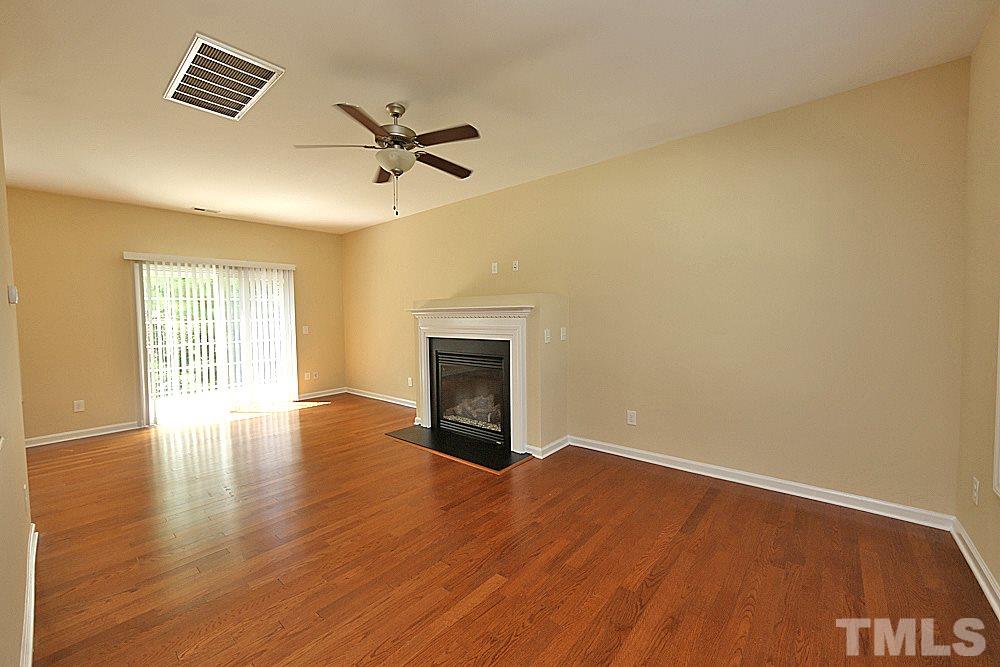 2014 Lime Street Durham, NC 27704 - Photo 3 of 17 wooden floor in an empty room with a window