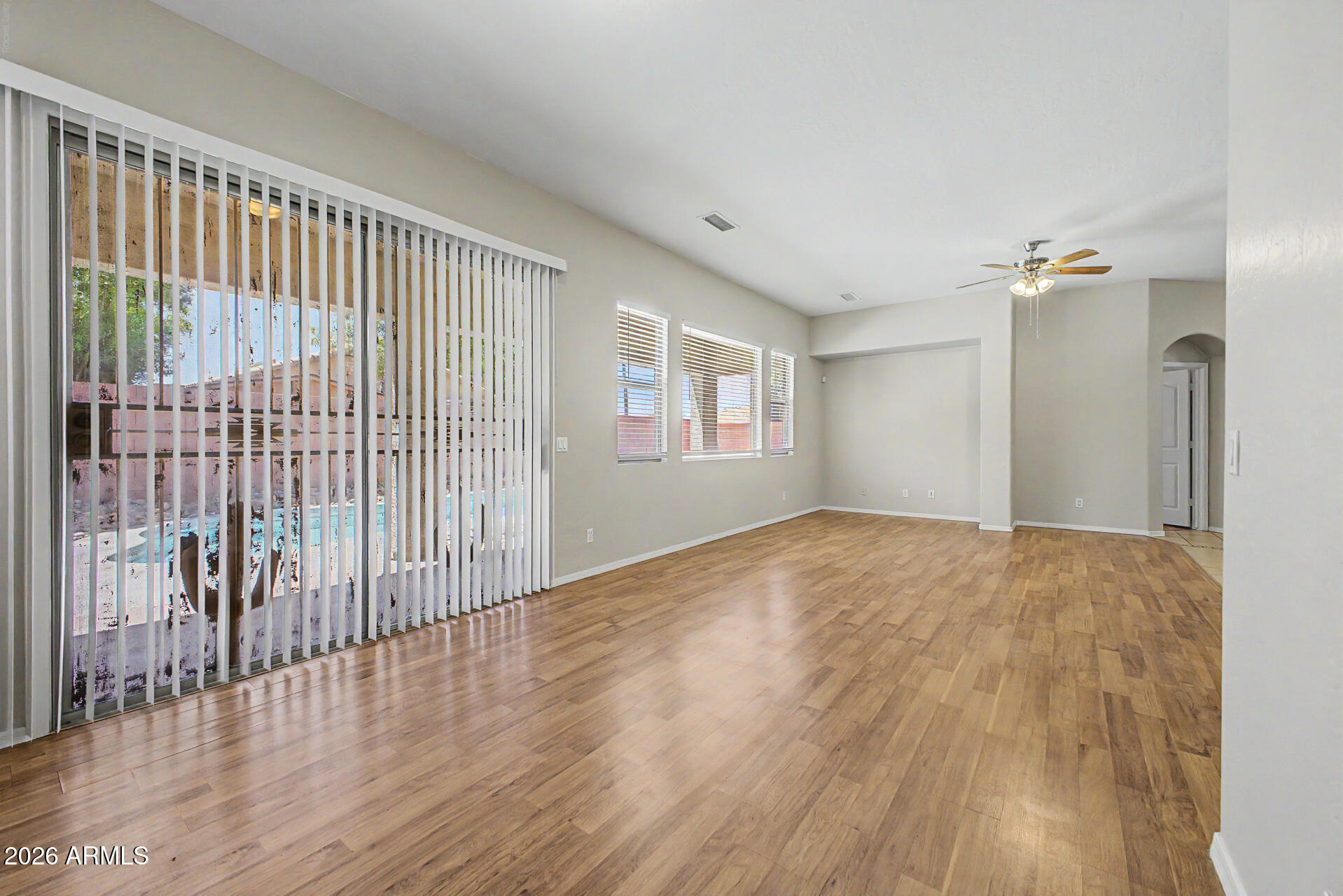 11199 West Monte Vista Road Avondale, AZ 85392 - Photo 4 of 36 a view of an empty room and wooden floor