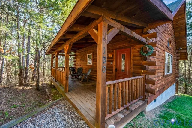 a kitchen with stainless steel appliances granite countertop a refrigerator a stove and a sink