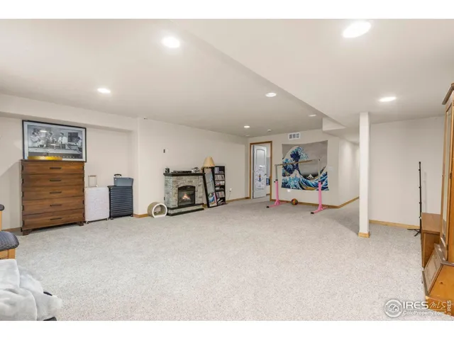 a view of a livingroom with furniture and a livingroom with furniture