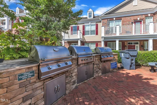 a view of a chairs and table in a patio