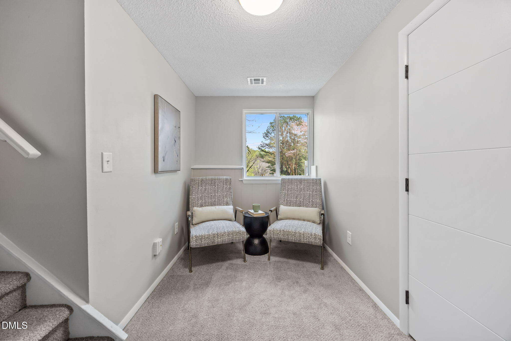 7809 Kitty Lane Raleigh, NC 27615 - Photo 12 of 29 a living room with furniture and a window