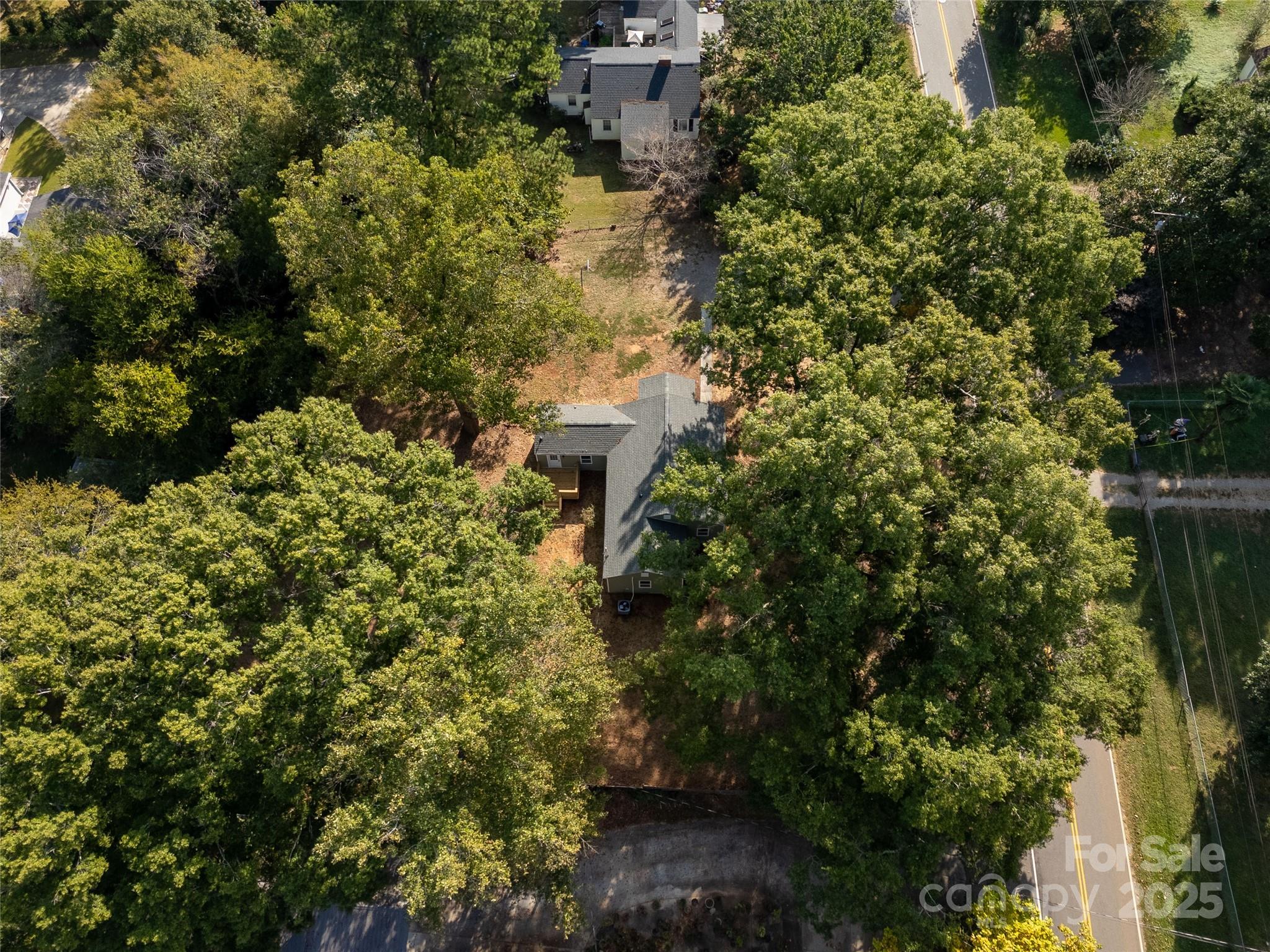 951 Confederate Avenue Lancaster, SC 29720 - Photo 27 of 29 an aerial view of residential house with outdoor space and trees all around