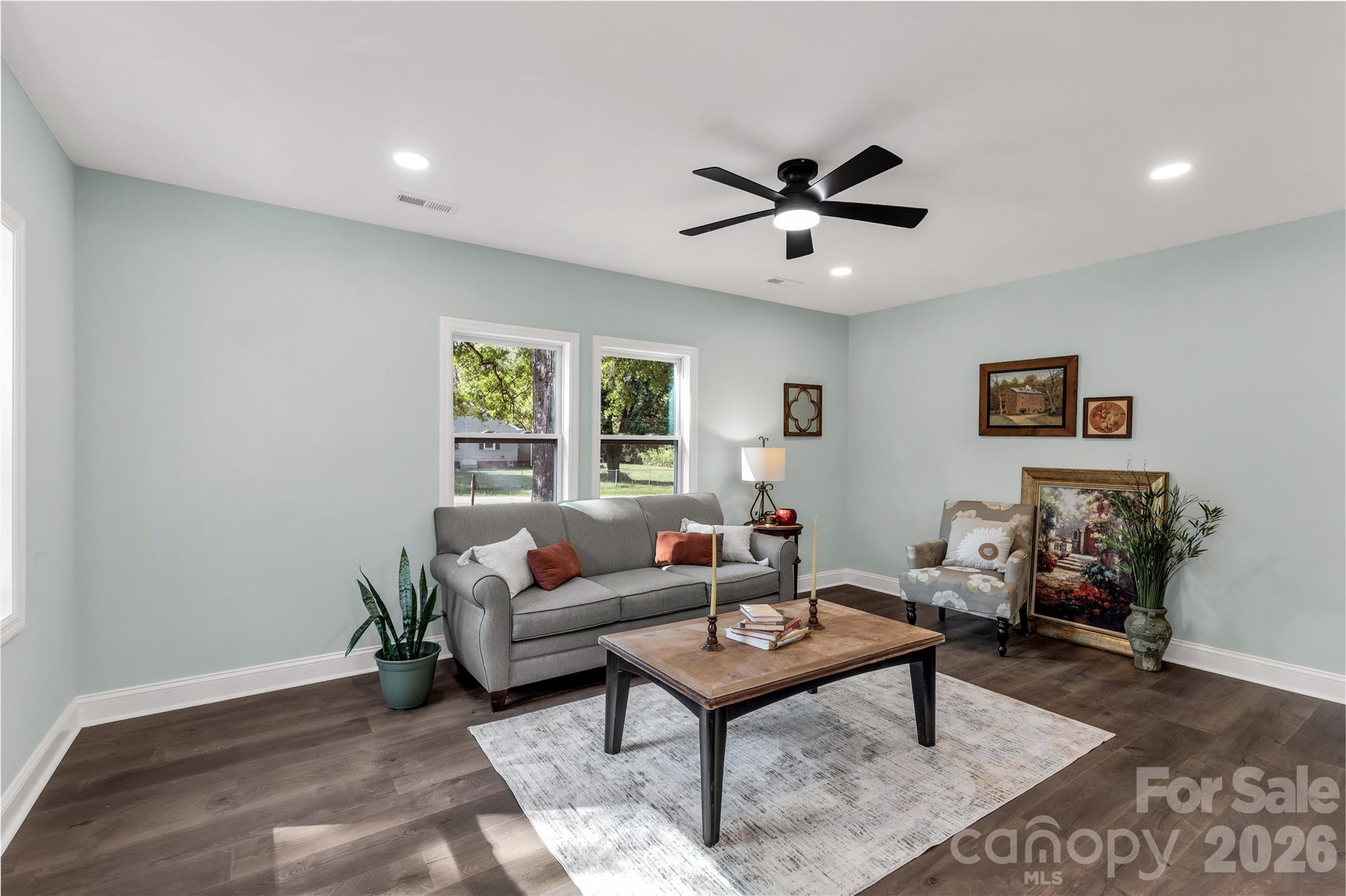 951 Confederate Avenue Lancaster, SC 29720 - Photo 8 of 29 a living room with furniture a window and a potted plant