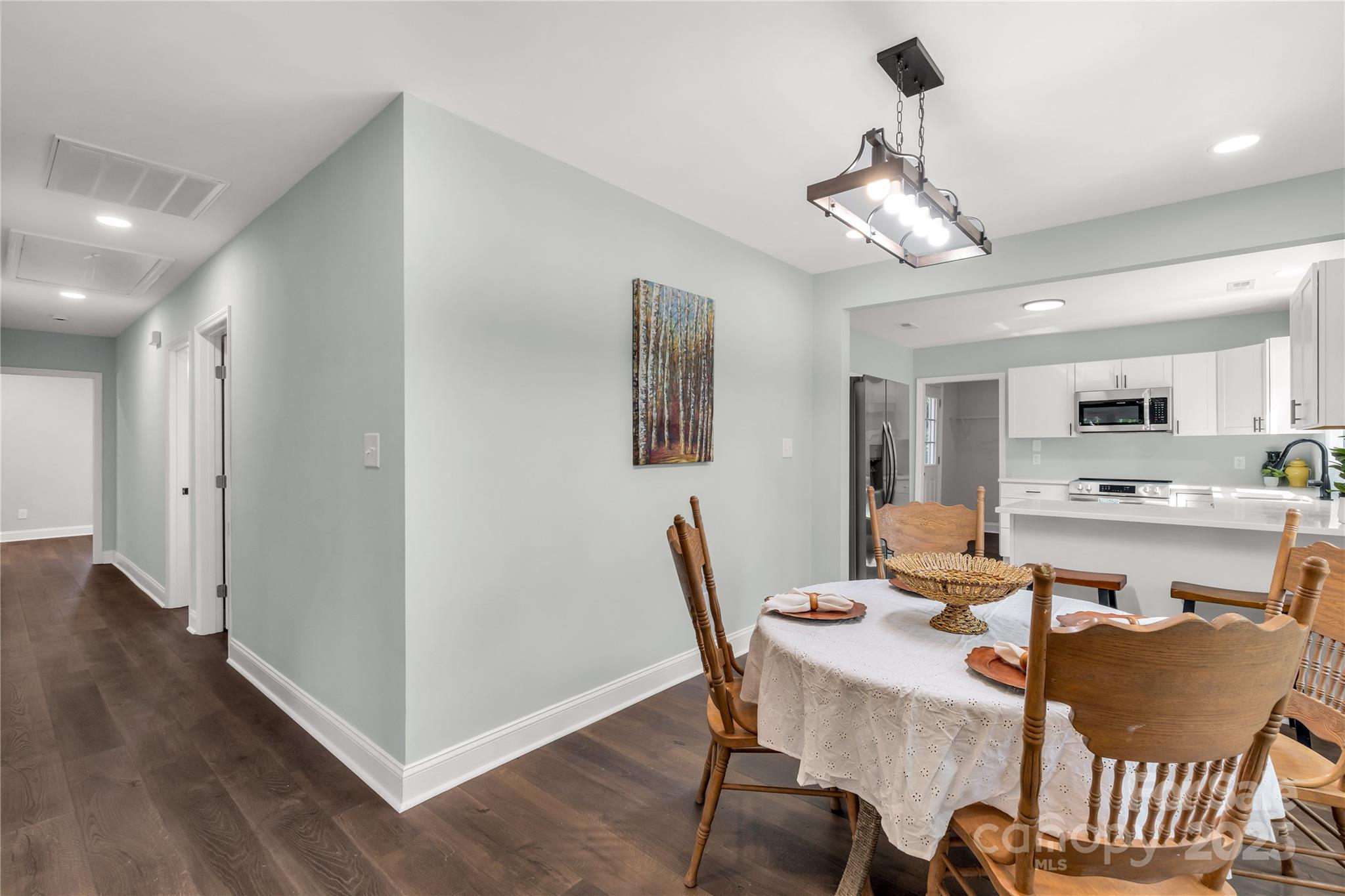 951 Confederate Avenue Lancaster, SC 29720 - Photo 8 of 29 a view of a dining room with furniture wooden floor and chandelier