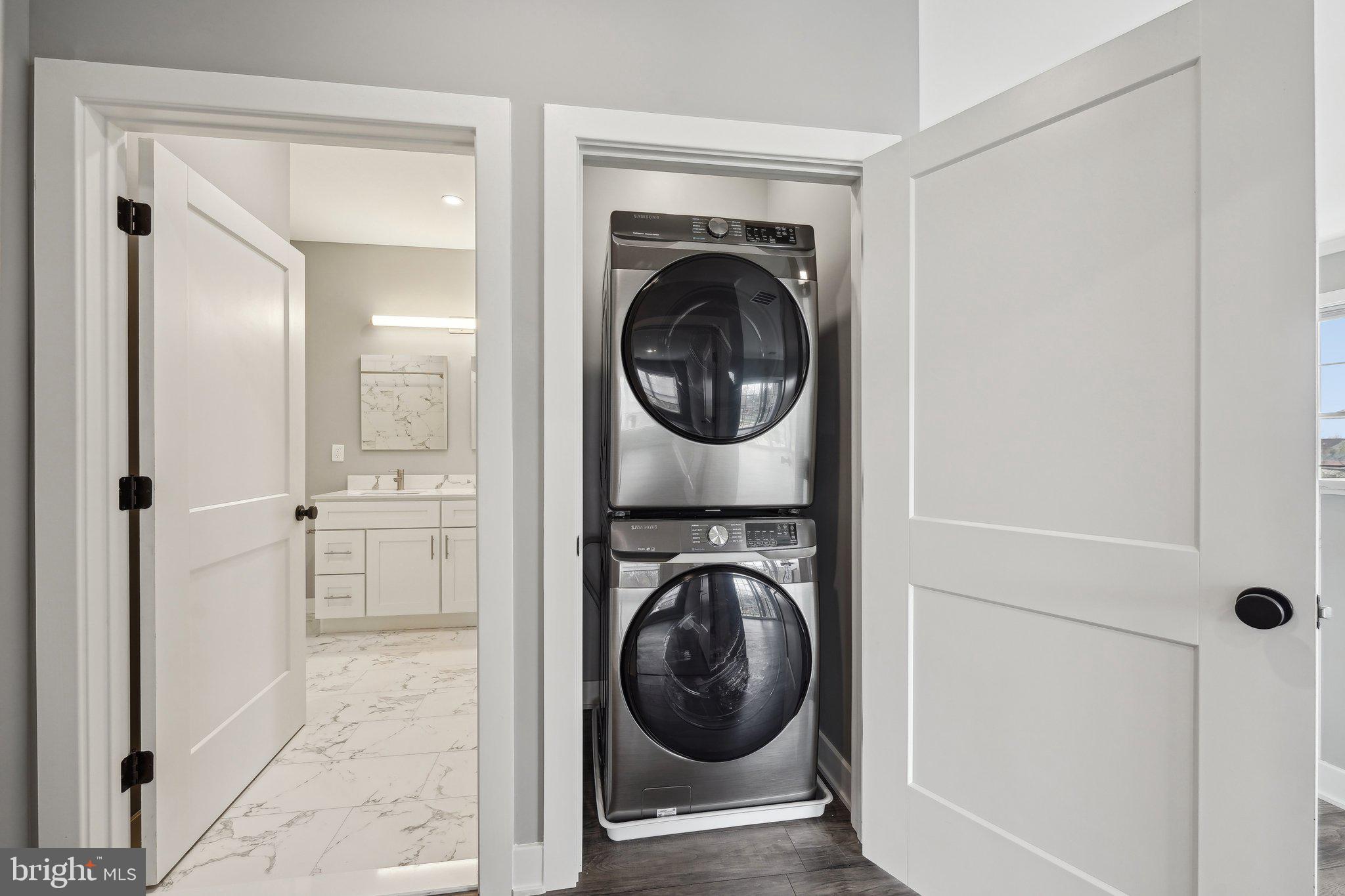 2421 Bristol Road, Unit 3B305 Warrington, PA 18976 - Photo 18 of 50 a view of a hallway with washer and dryer