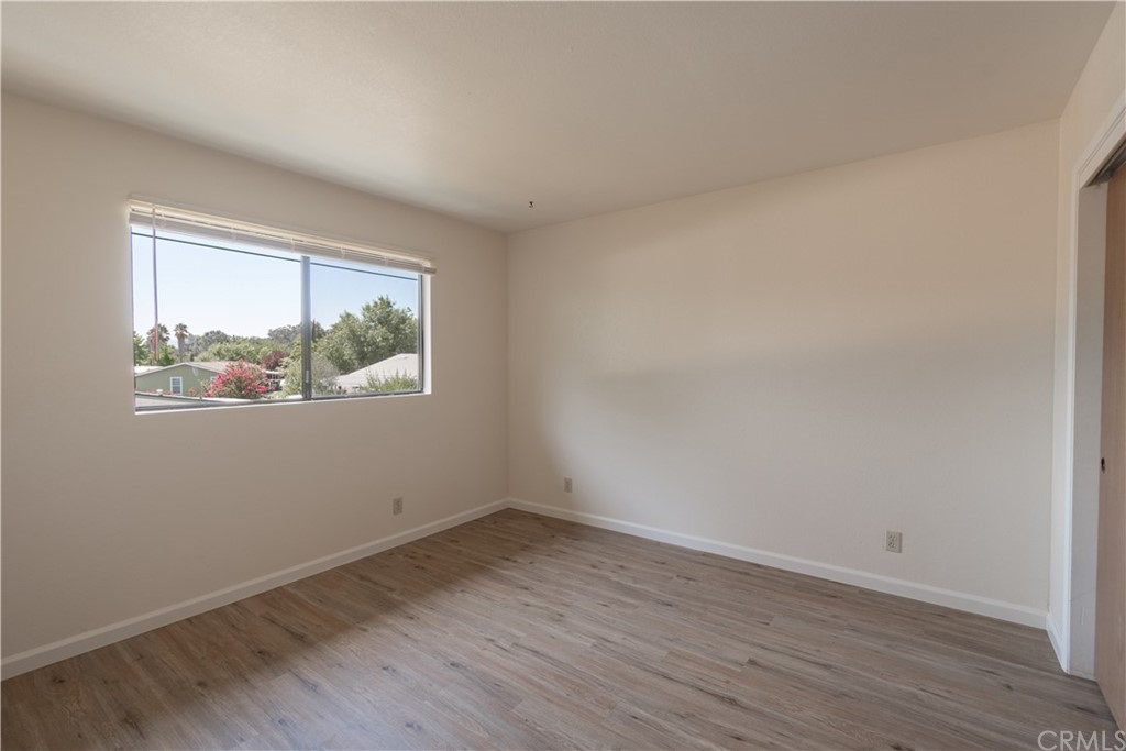 9176 Tiburon Circle, Unit 3 Atascadero, CA 93422 - Photo 11 of 16 2nd. bedroom with new flooring, paint and window blinds