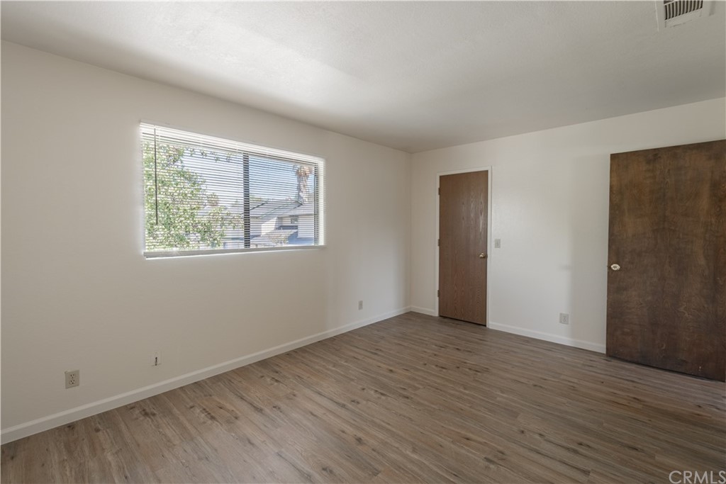 9176 Tiburon Circle, Unit 3 Atascadero, CA 93422 - Photo 13 of 16 3rd bedroom with walk-in closet, new flooring, paint and window blinds.