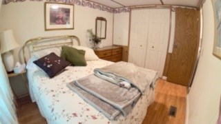 19 My Own Road Blairsville, GA 30512 - Photo 11 of 16 a bedroom with a bed and a window