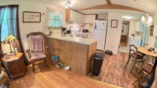 19 My Own Road Blairsville, GA 30512 - Photo 6 of 16 a bathroom with a sink mirror and a shower