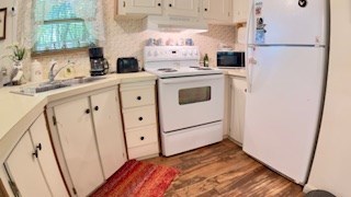19 My Own Road Blairsville, GA 30512 - Photo 8 of 16 a view of a kitchen with appliances and cabinets