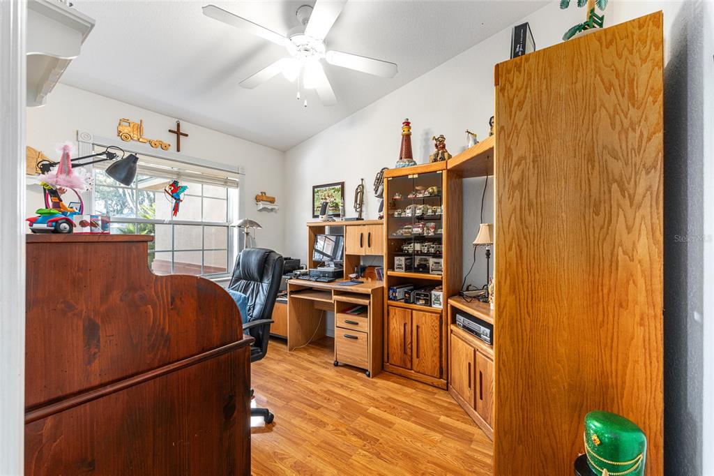 10090 Southwest 78th Court Ocala, FL 34476 - Photo 31 of 52 a kitchen with stainless steel appliances granite countertop a refrigerator and a stove top oven