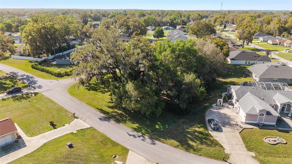 10090 Southwest 78th Court Ocala, FL 34476 - Photo 51 of 52 an aerial view of residential houses with outdoor space