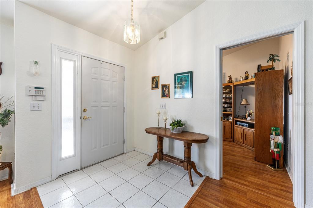 10090 Southwest 78th Court Ocala, FL 34476 - Photo 10 of 52 a view of a livingroom with furniture and closet area