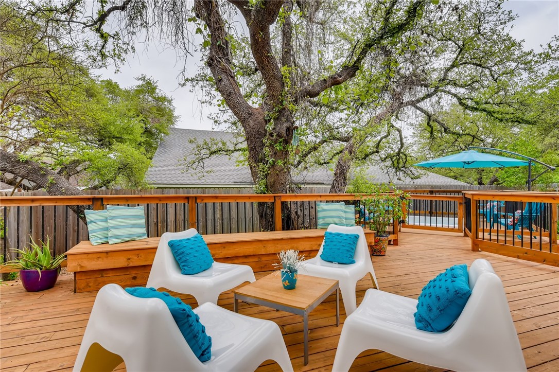 swimming pool view with a seating space