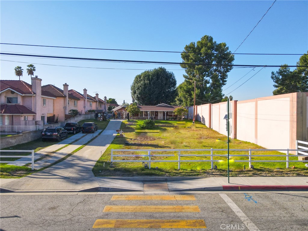 3903 Gilman Road El Monte, CA 91732 - Photo 1 of 10 a view of a swimming pool with a lounge chairs