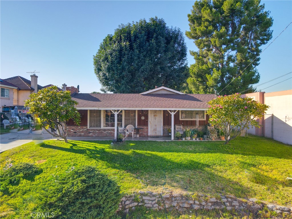 3903 Gilman Road El Monte, CA 91732 - Photo 10 of 10 a view of a house with a yard porch and sitting area