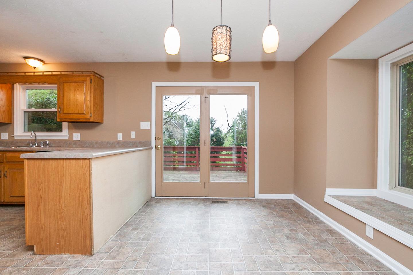 794 Spring Circle Springfield, TN 37172 - Photo 7 of 16 a view of a kitchen with a sink cabinet and a large window
