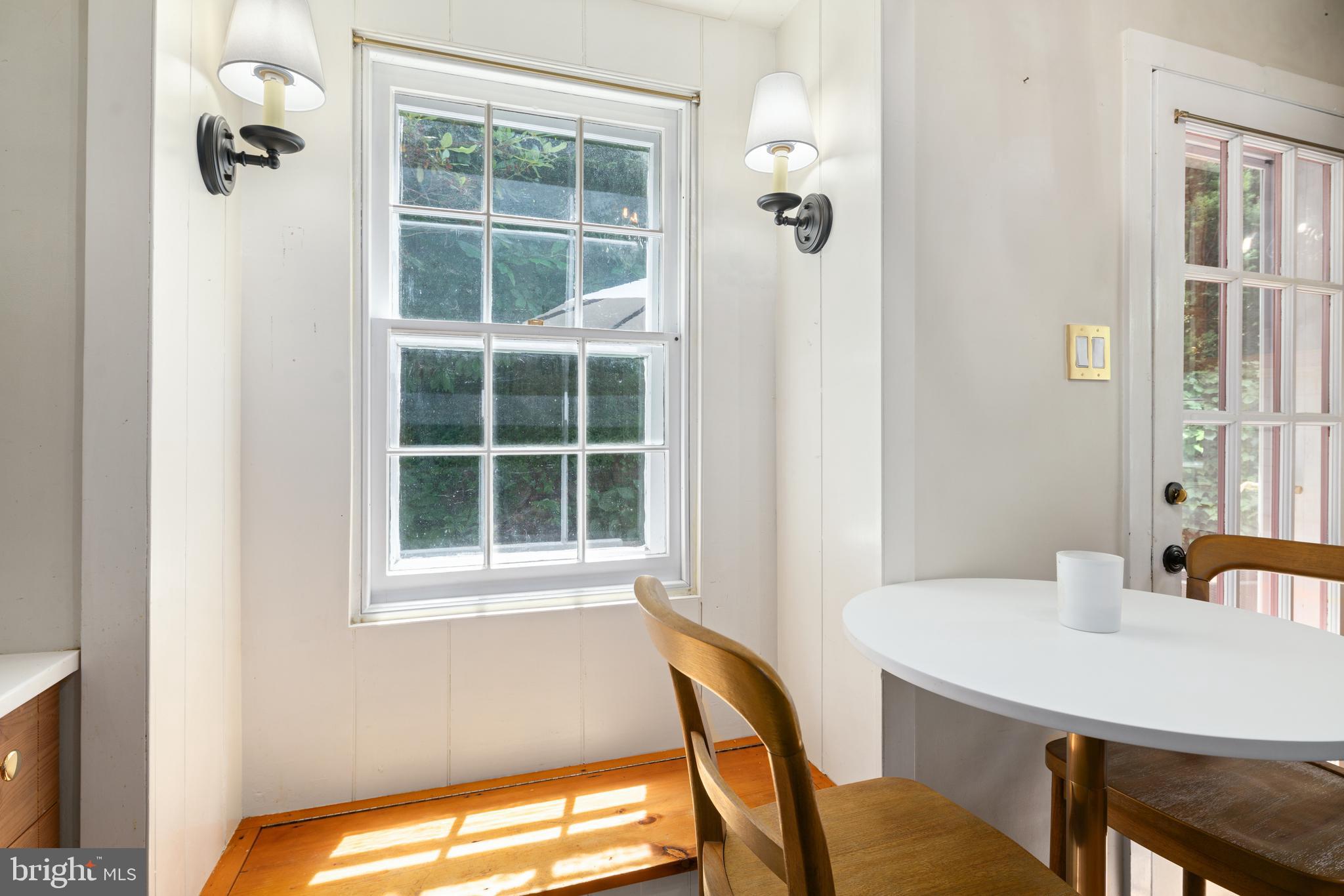 75 West Rose Valley Road Rose Valley, PA 19086 - Photo 11 of 31 a view of a room that has a window and a table in it