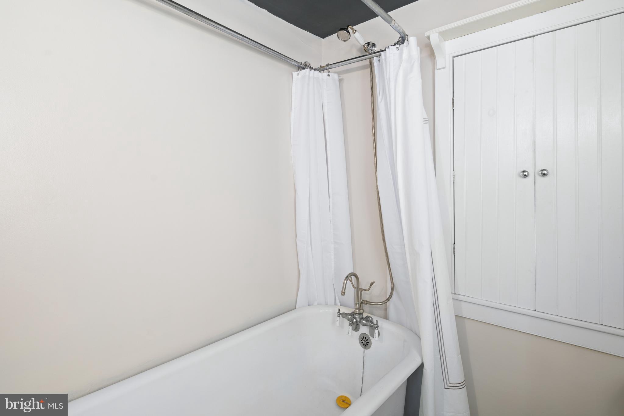75 West Rose Valley Road Rose Valley, PA 19086 - Photo 18 of 31 a bathroom with a tub and a shower