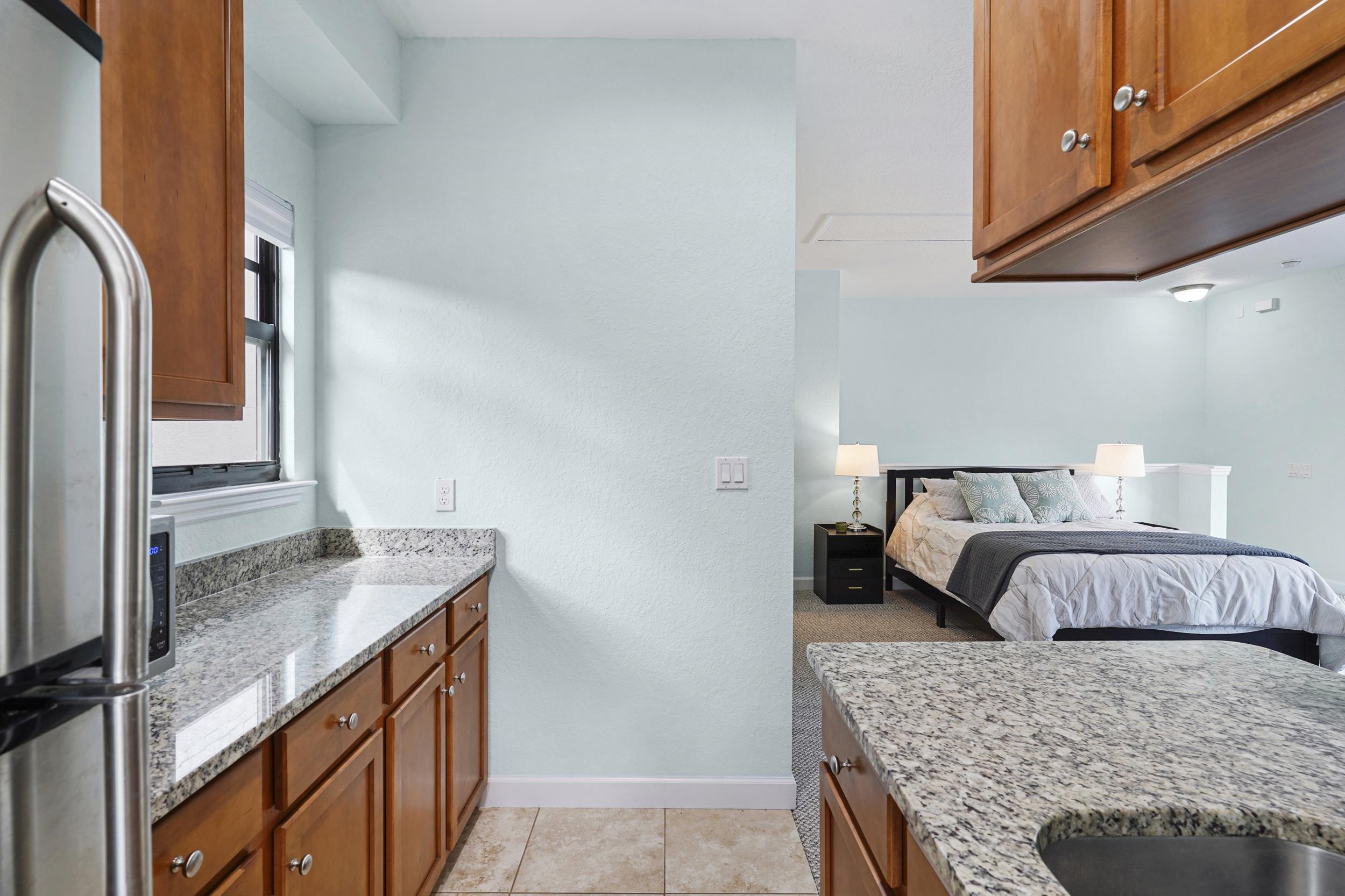 Undisclosed Address St. Augustine, FL 32095 - Photo 13 of 23 a bedroom with a bed and a dresser