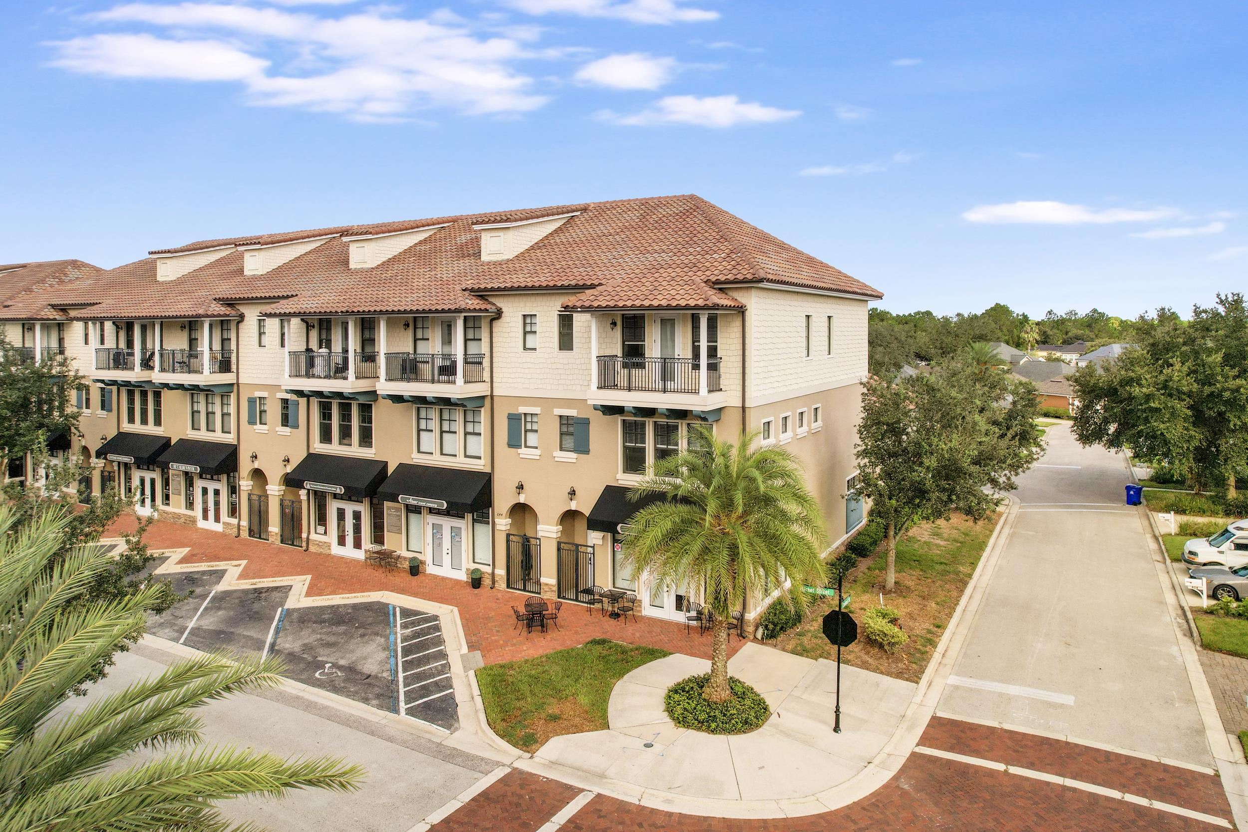 Undisclosed Address St. Augustine, FL 32095 - Photo 2 of 23 a view of a white house with swimming pool and sitting area