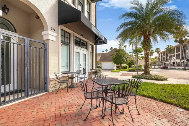 a view of washer and dryer with a white sign