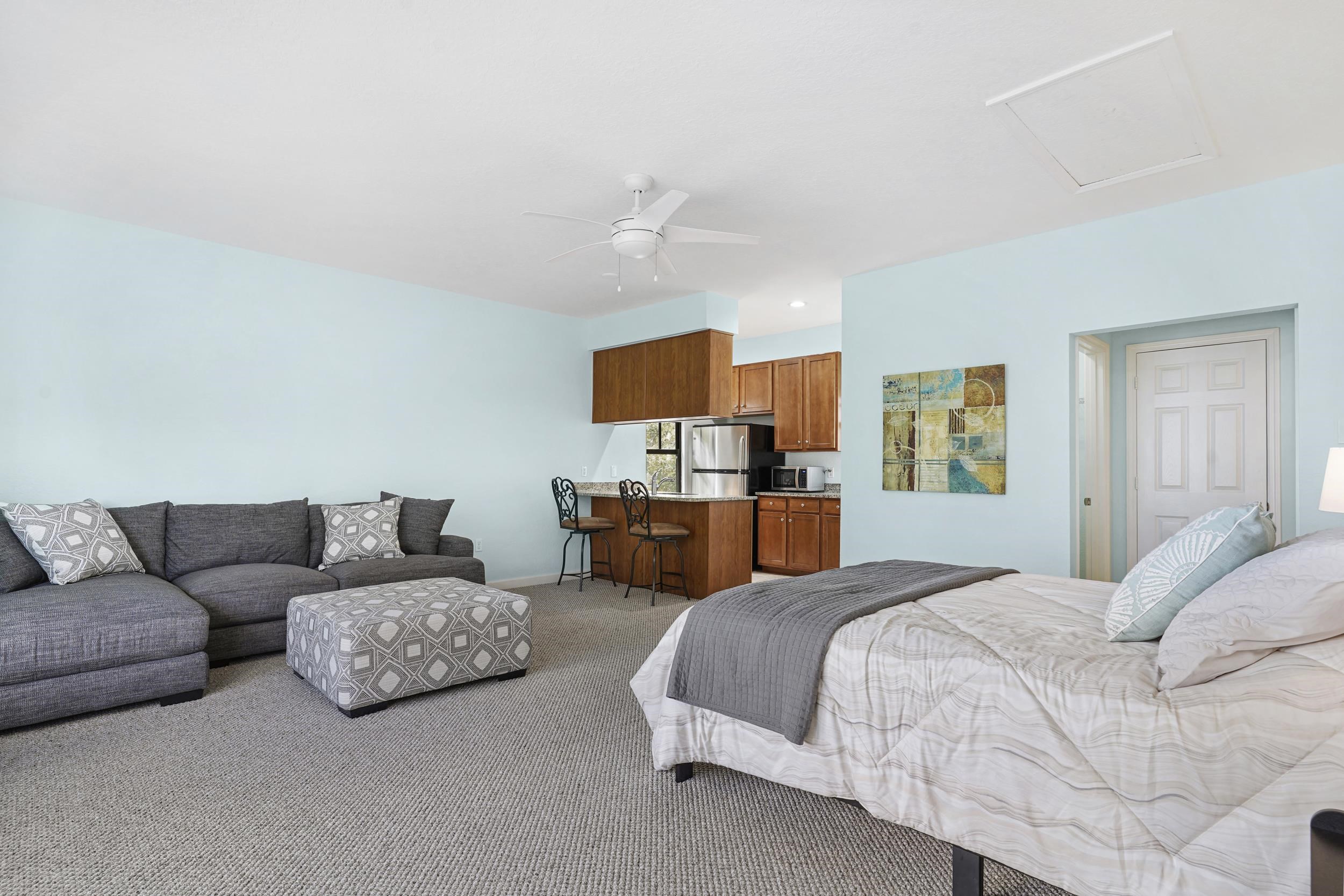 Undisclosed Address St. Augustine, FL 32095 - Photo 7 of 23 a bedroom with furniture and a couch