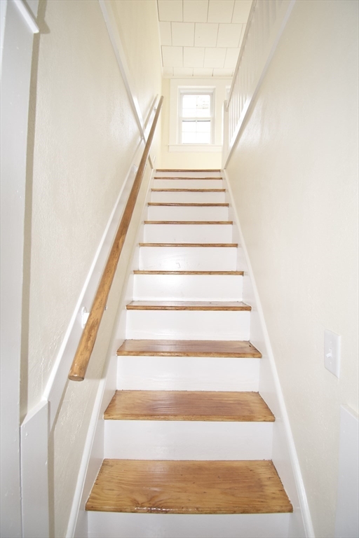 158 Gilbert Avenue Springfield, MA 01119 - Photo 16 of 30 a view of staircase with white walls