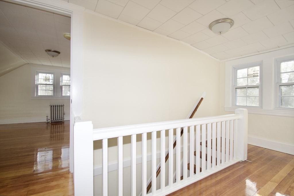 158 Gilbert Avenue Springfield, MA 01119 - Photo 17 of 30 a view of hallway with windows
