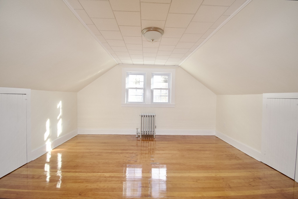 158 Gilbert Avenue Springfield, MA 01119 - Photo 20 of 30 a view of empty room with wooden floor and fan