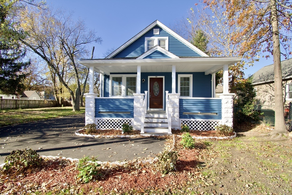 158 Gilbert Avenue Springfield, MA 01119 - Photo 2 of 30 a front view of a house with a yard
