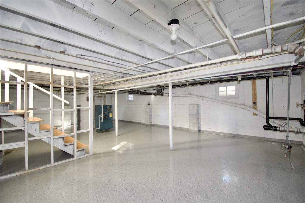 158 Gilbert Avenue Springfield, MA 01119 - Photo 25 of 30 a view of a room with wooden shelves