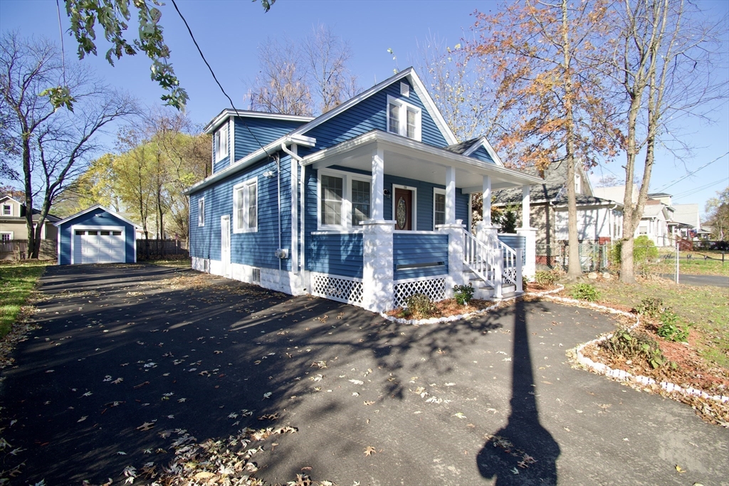 158 Gilbert Avenue Springfield, MA 01119 - Photo 3 of 30 a front view of a house with a yard